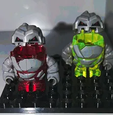 LEGO Rock Monster Minifigures Lot of 2 Trans-Red & Trans-Neon Green