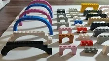 LEGO Lot of 55 Arches, Many Colors and Sizes. qty 4 of 6184 and 5 other sizes.