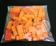 LEGO By The Pound Orange Bricks 2.9 oz Bag