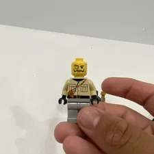 LEGO Minifigure Yellow Head Tan Torso w/ Pockets Strap, Gray Legs, Black Hands