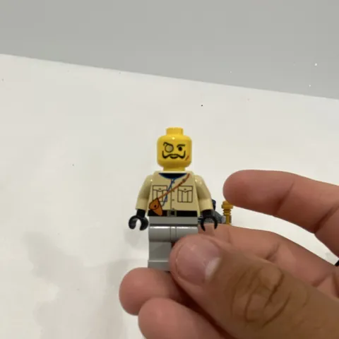 LEGO Minifigure Yellow Head Tan Torso w/ Pockets Strap, Gray Legs, Black Hands