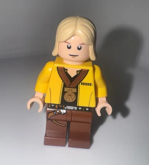 LEGO Minifigures Female Minifigure Blonde Hair Yellow Jacket, Brown Pants