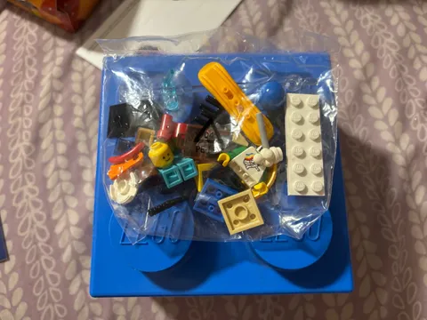 lego passport and buildable lego brick and 2 bag of  miscellaneous lego brick