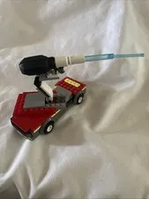 LEGO red yellow vehicle articulated robotic arm blue laser black sensory array