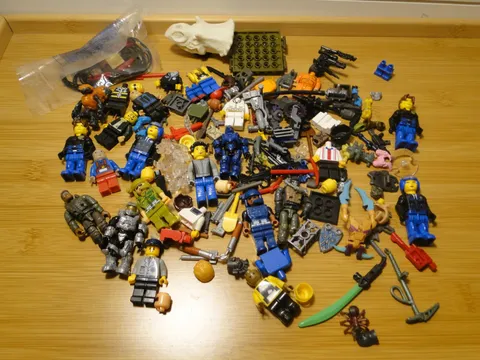 Lego Juniors Minifigures Mega Bloks and Various other parts Pieces Weapons Mixed