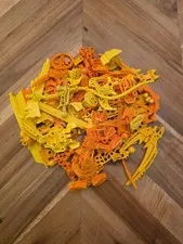 About 1 Half Pound Yellow/Orange Lot Of Bionicle Parts - (7.9 Oz)