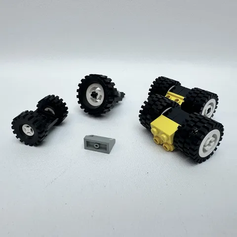 Lego Wheels - Axles - Tires Assorted Lot.  Missing One Wheel & Tire.