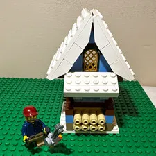 LEGO Set #10229 Winter Log Cabin Lumberjack Minifigure w/ Chainsaw & axe (2012)