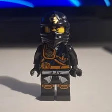 LEGO NINJAGO Black Ninja Minifigure with Orange Print and Gold Details