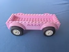 LEGO parts, pink vehicle base w/ rubber wheels, 8x16x2 1/3, #18937