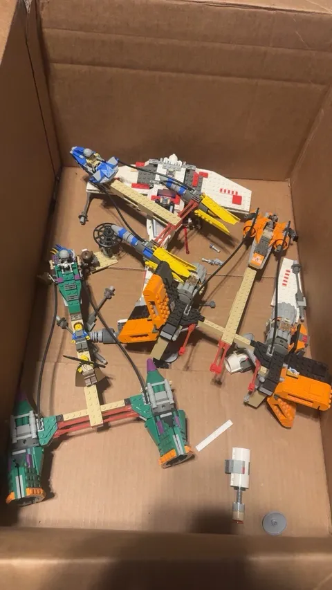Lego Star Wars. Old Mos Espa pod racer set with an old Luke Skywalker x wing. 