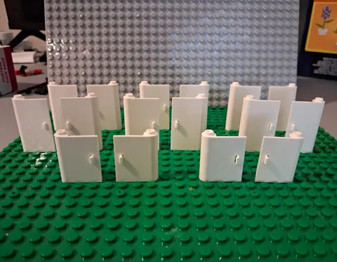 Lego Pivot Doors In White. 6 sets Of 1x3x4. 2 Sets Of 1x3x3.
