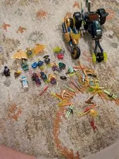 lego Ninjago lots of characters and lots of weapons and vehicles