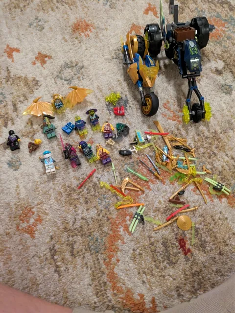 lego Ninjago lots of characters and lots of weapons and vehicles