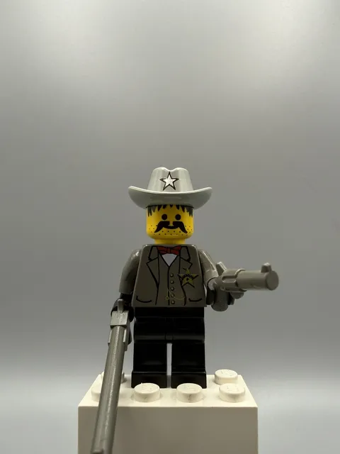 Vintage Retired Lego Mini Figure: Sheriff (Wild Wyatt West / Duke) ww021