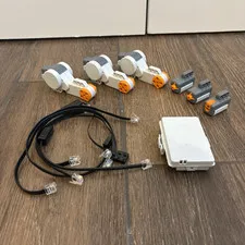 LEGO Mindstorms NXT 9797 Lot 3 Servo Motors, 3 Sensors, 5 Cables, and a Battery!