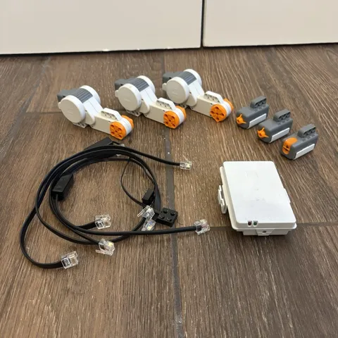 LEGO Mindstorms NXT 9797 Lot 3 Servo Motors, 3 Sensors, 5 Cables, and a Battery!