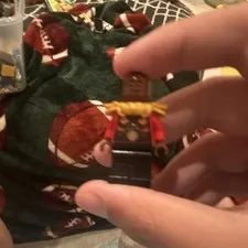 A Lego Mini figure Of Okoye From Marvel Super Hero’s Set 76247
