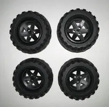 lego lot of four large wheels with tires from set 9398 4 x 4 crawler