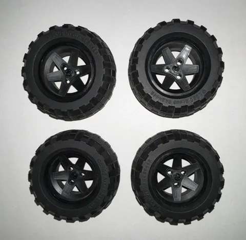 lego lot of four large wheels with tires from set 9398 4 x 4 crawler