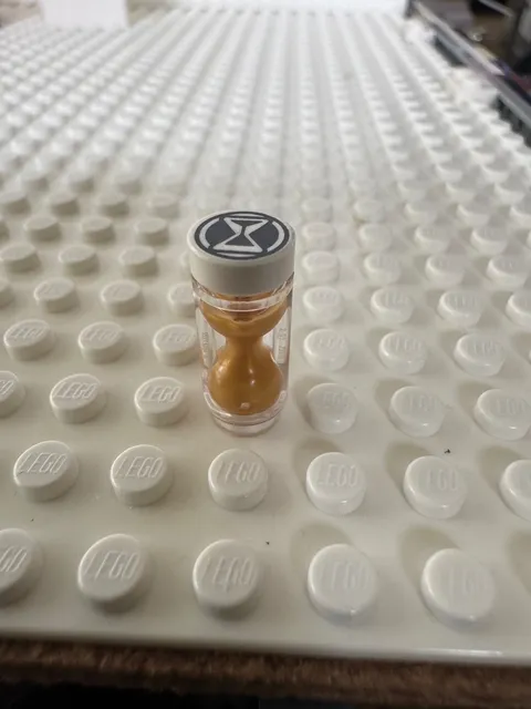 LEGO Minifigure, Utensil Hourglass with Molded Pearl Gold Sand Pattern 23945pb03