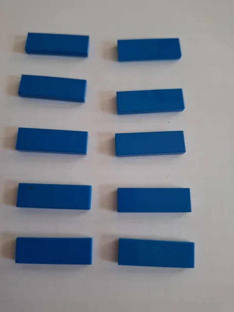 No 335.  lego tile 1x3.   63864 Blue