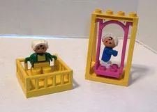 2 Lego DUPLO Babies Toddlers + playpen & swing