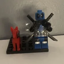 LEGO Blue Deadpool Mini figure with Weapon Accessories and dogpool