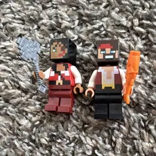 LEGO Minecraft Pirate Ship Voyage minifigures, Gray axe, and Orange fish