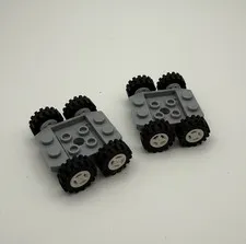 2 LEGO Light Bluish Gray Vehicle Base 3x4x2/3 Wheels Black & White Rims 24326