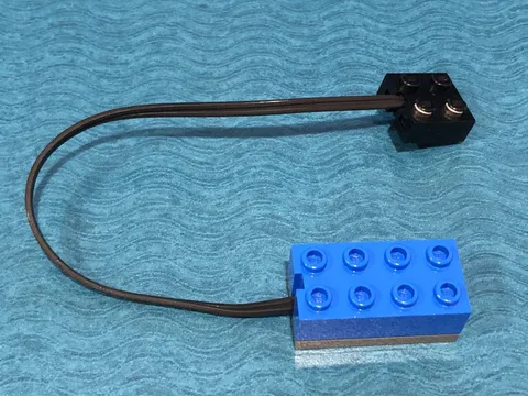 LEGO PART 2982 MINDSTORMS RCX LIGHT SENSOR 9V WITH BLUE 2X4 BRICK