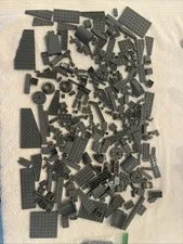 Lot of assorted  dark gray bricks & pieces.  14.7  ounces