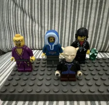 LEGO Minifigure Lot of 3 with Baseplate - Purple, Blue Hooded, Black Outfits