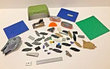 Group of over 50 pieces of Legos and Mega Blocks