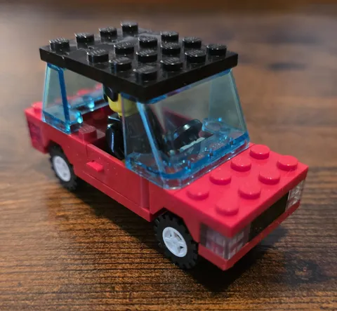 Vintage 1995(?) LEGO 200 Idea Book Red Saloon Car with LEGO City Tuxedo Male