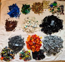 Lego collection of over 20 lbs of random parts and pieces + 82 minifigures.