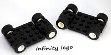 2 LEGO Black Car Base 7 x 4 x 0.7 with 4 Wheels 9mm White Rim (2441 68556)