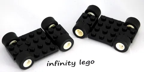2 LEGO Black Car Base 7 x 4 x 0.7 with 4 Wheels 9mm White Rim (2441 68556)