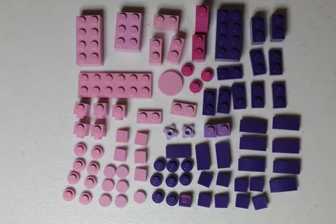 Assorted Mostly Small Pink and Purple Legos
