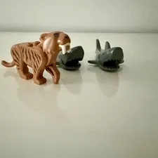 3 LEGO Animals/minifigures: Saber Tooth Tiger And 2 Sharks