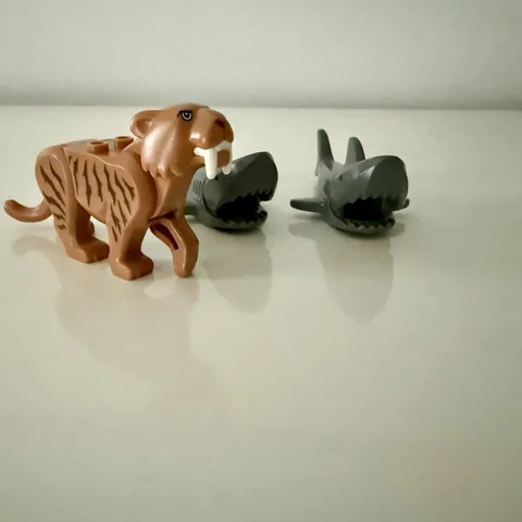 3 LEGO Animals/minifigures: Saber Tooth Tiger And 2 Sharks