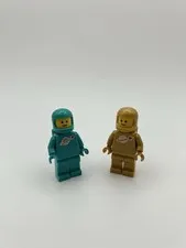 Lego Pearl Gold and Teal Classic Spaceman Minifigures from 21358 Vending Machine