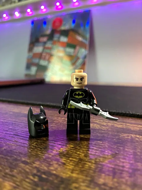 LEGO Batman Minifigure - Black Cowl/Helmet, Gray Batarang, Silver Weapon