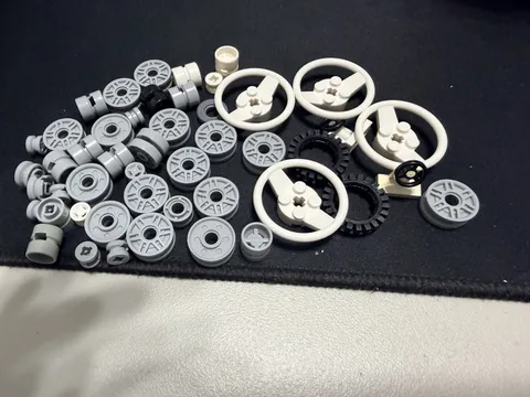 Lego Wheel Hubcaps, wheels and steering wheels…total 48
