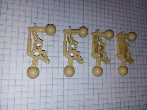 4 of Lego part 32173 in Tan Leg Technic Ball Joint 2 x 7 w/ 2 Ball Joint retired