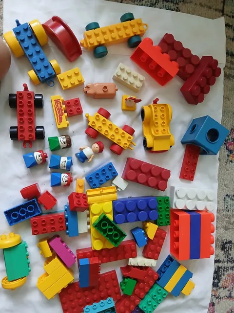Lego Duplo Random Assortment  Pieces,  Vehicles, figure heads. incomplete set