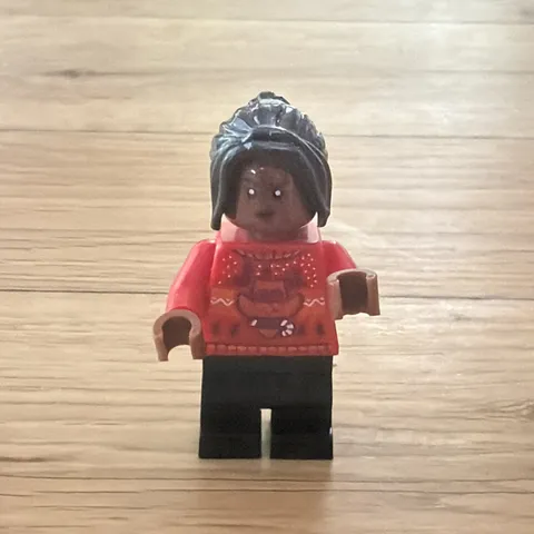 LEGO Minifigure: Angelina Johnson: Red Holiday Sweater, Black Medium Legs (hp593