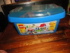 near 4 pounds of bulk loc blok building toys in lego storage container lock bloc