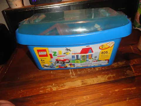 near 4 pounds of bulk loc blok building toys in lego storage container lock bloc