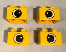 Lot of 4 Bricks Lego Duplo Bricks 2x2 Yellow Crossed Eyes